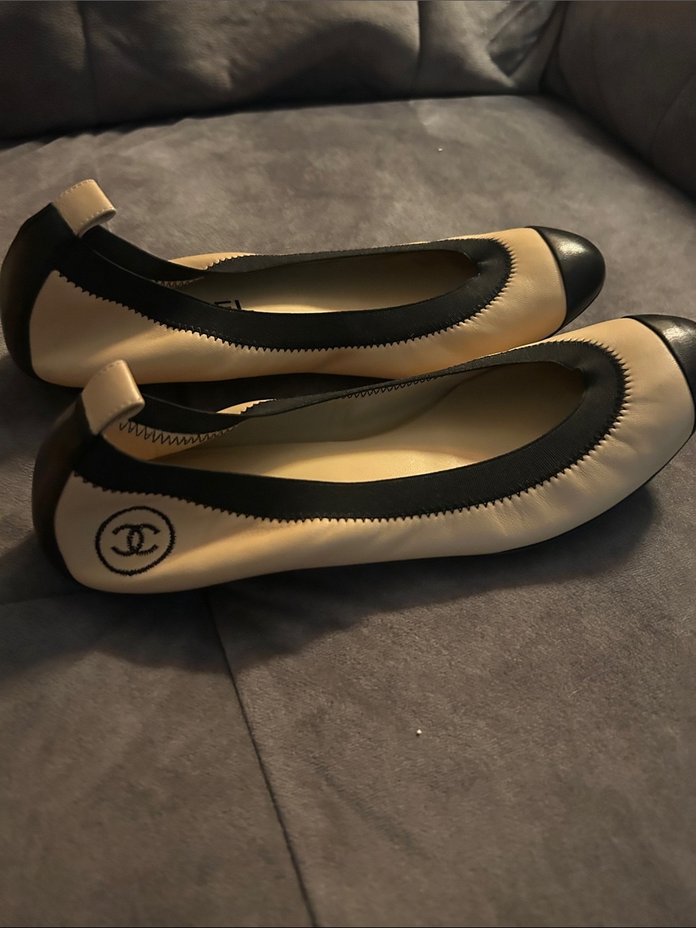 CHANEL Beige and Black Cap-Toe Ballet Flats